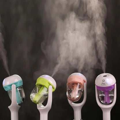 CSSV FILE Nanum Car Humidifier Diffuser shown in a sleek design, compact for easy use in vehicles, with mist output visible.